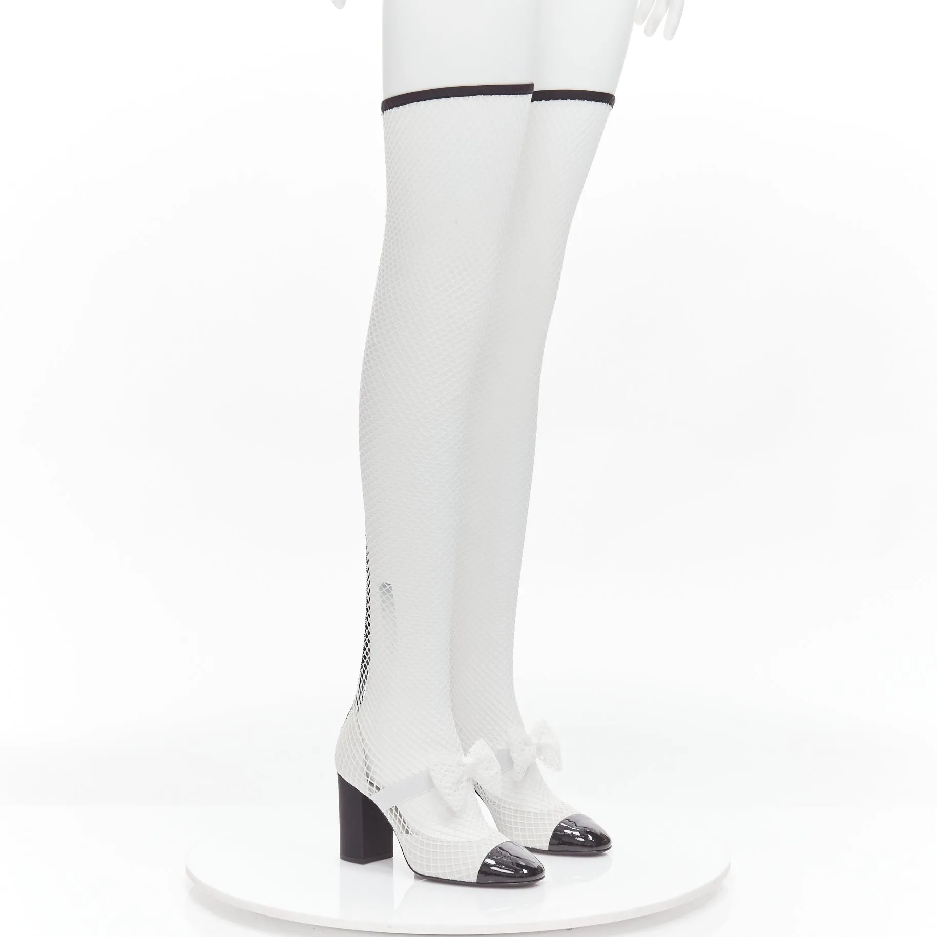 CHANEL 2023 Runway black toe cap white bow CC fishnet thigh high heels EU38.5